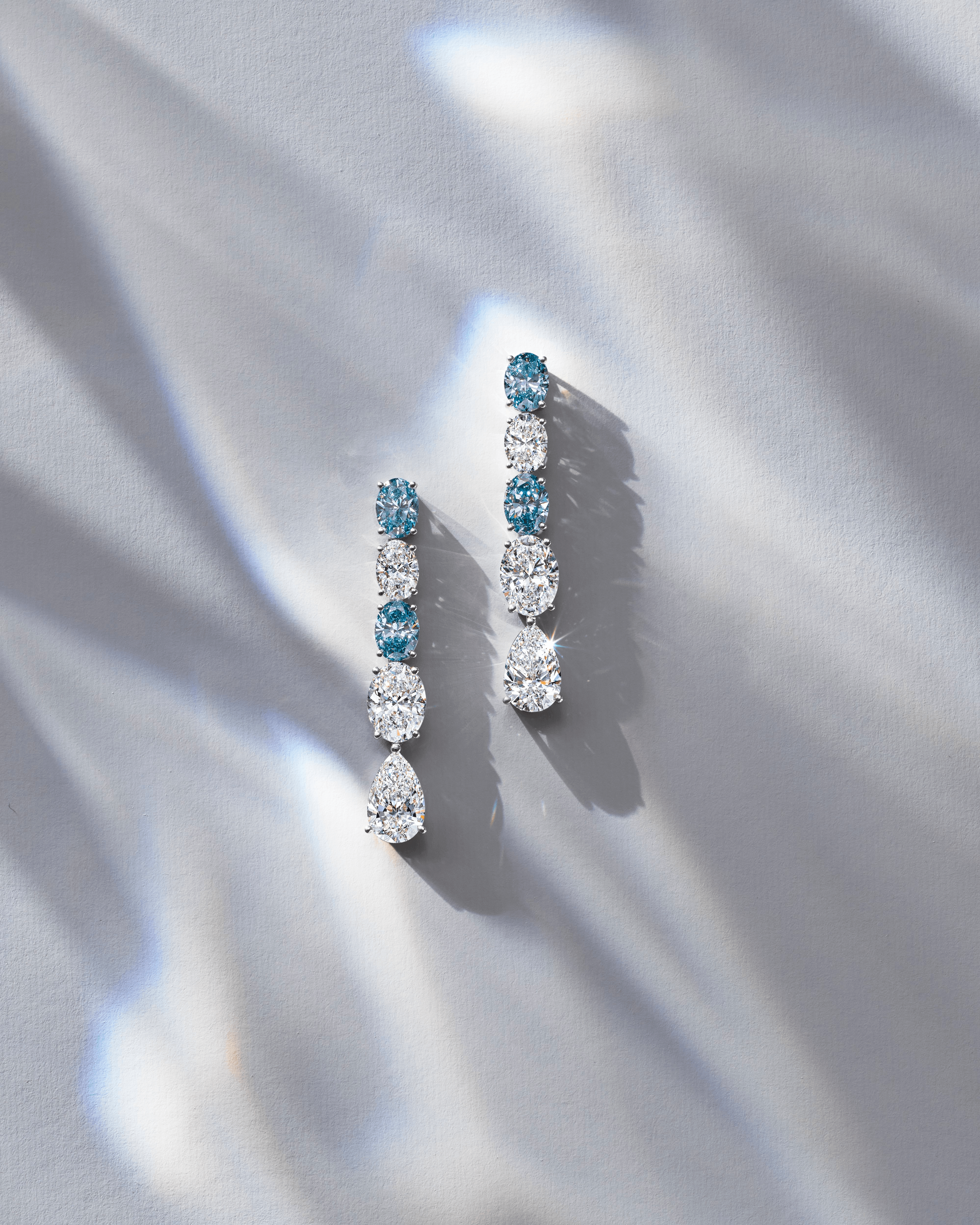 "LUMINOUS BLUE" BLUE DIAMOND EARRINGS / 4.909 CTW
 18K White Gold