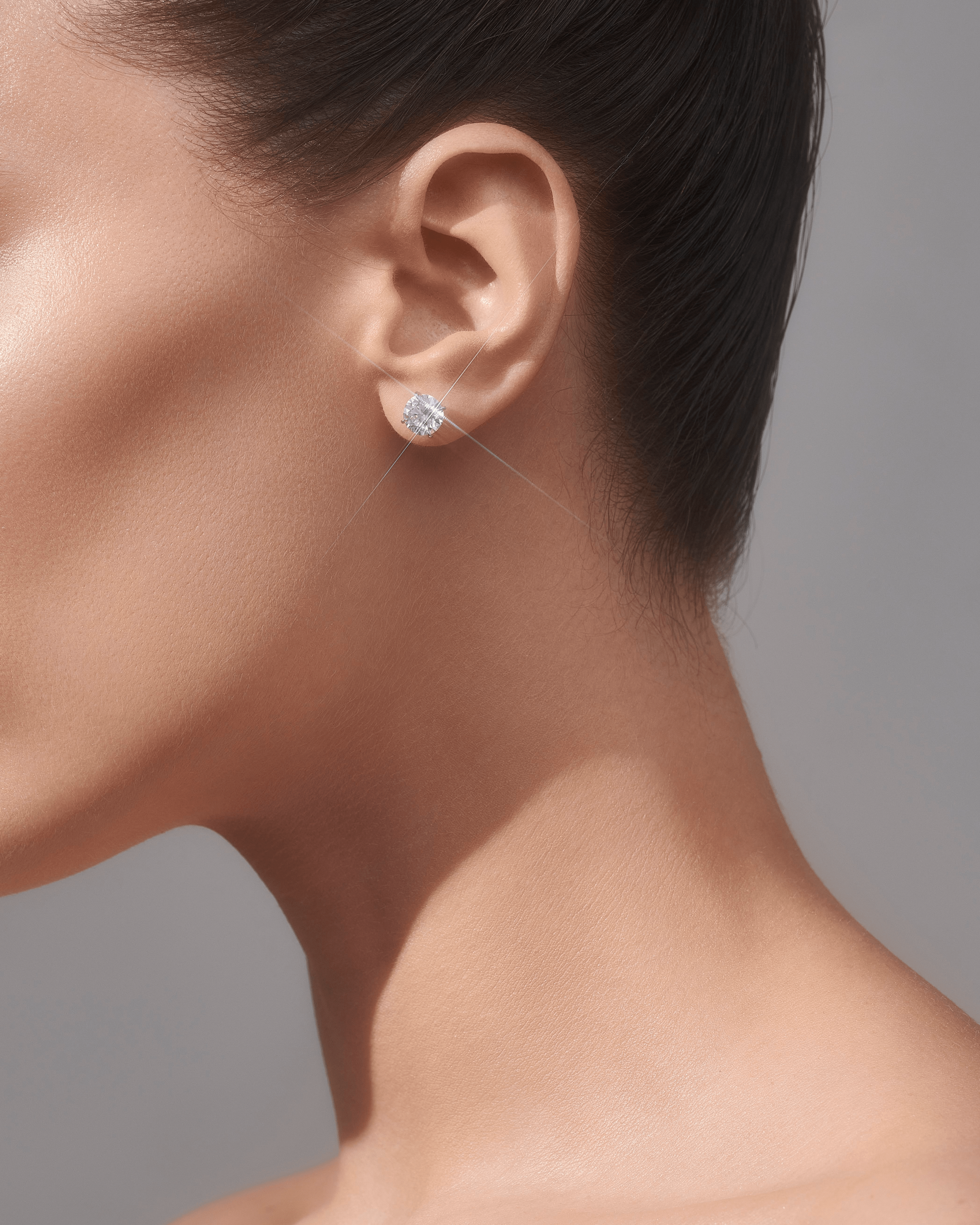 ROUND BRILLIANT STUDS
2.70 CTW 18K White Gold 