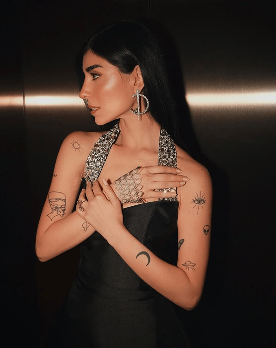 Zeina Makki wearing Suzanne Code jewelry