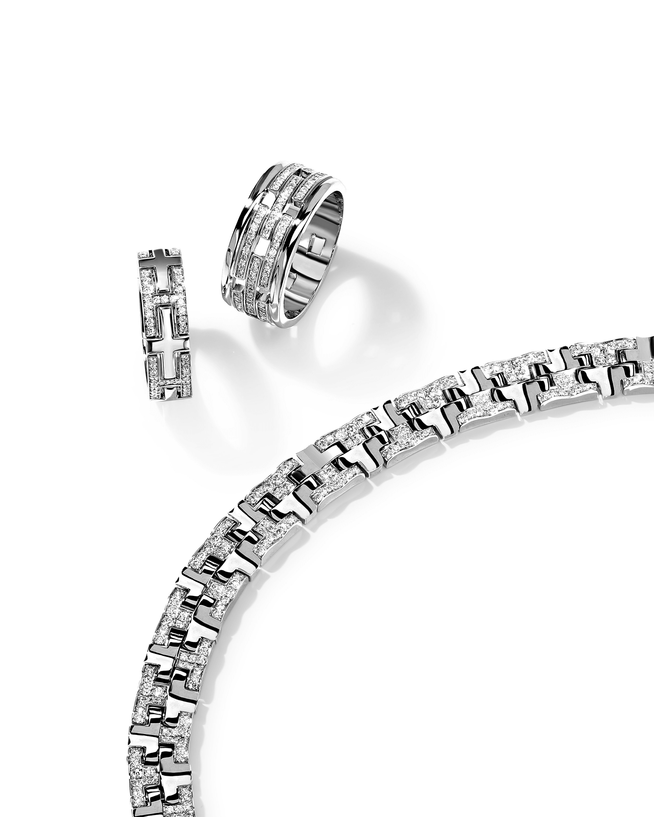 "TTAURI" DIAMOND TRIPLE ETERNITY BAND 120
0.656 CTW 18k White Gold