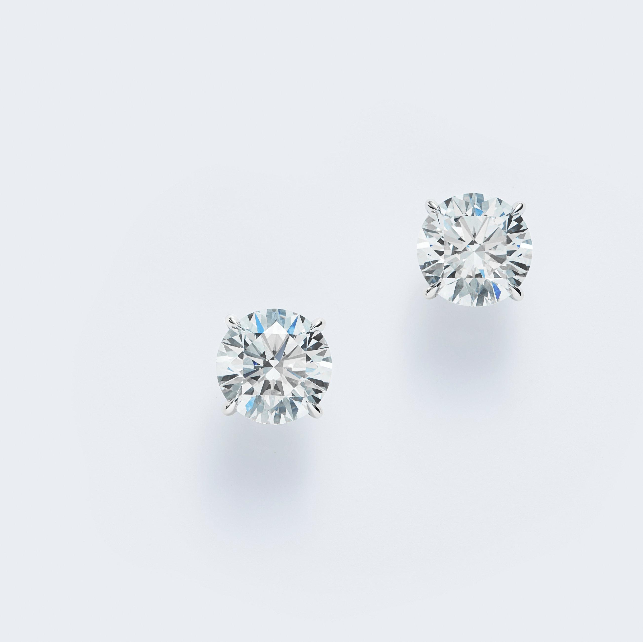 ROUND BRILLIANT STUDS
4.14 CTW 18K White Gold
