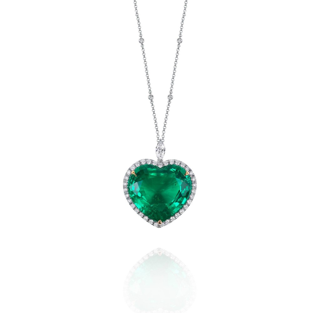 Necklace, 18-carat white gold with diamonds and emeralds